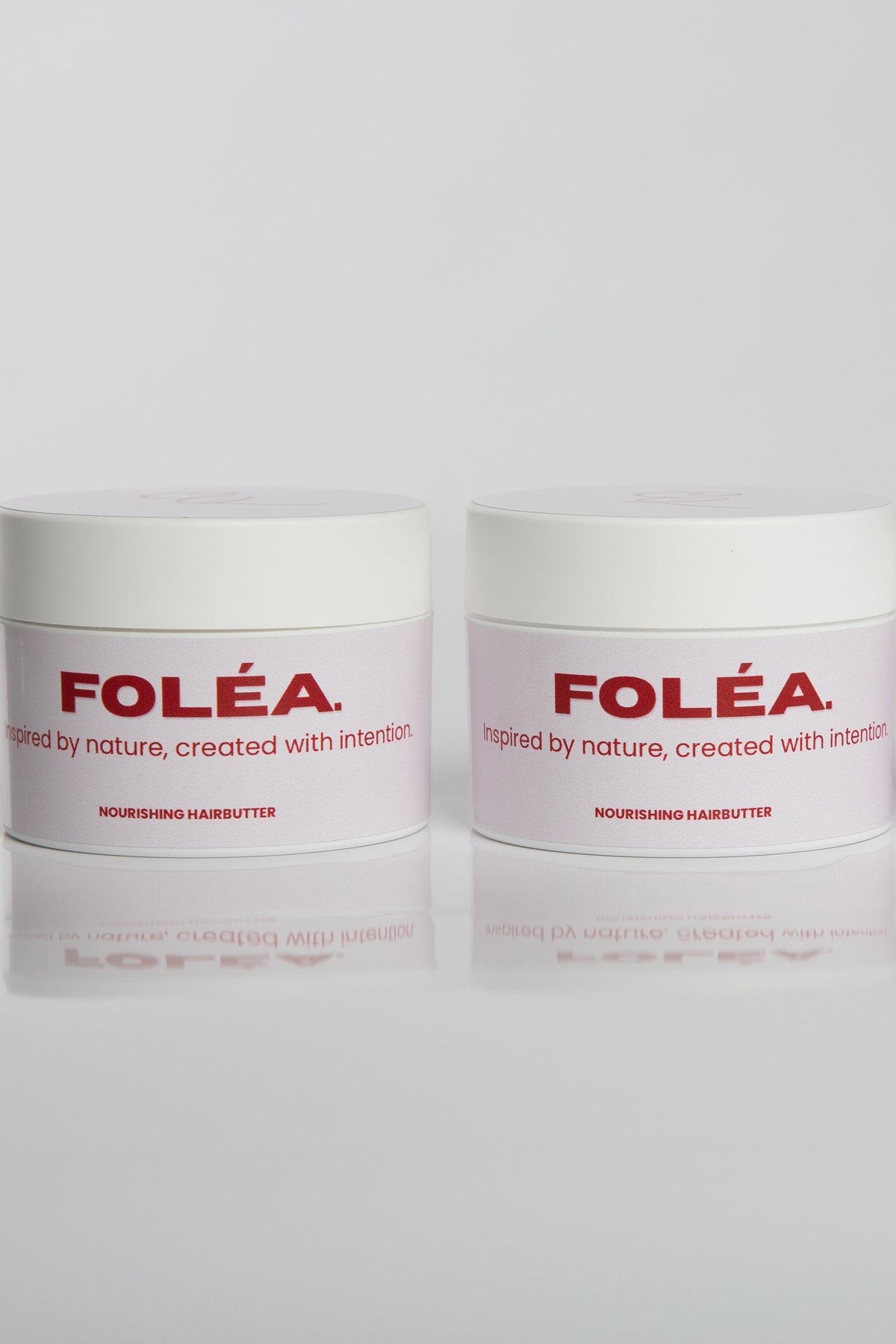 Drie potten FOLÉA Nourishing hairbutter naast elkaar